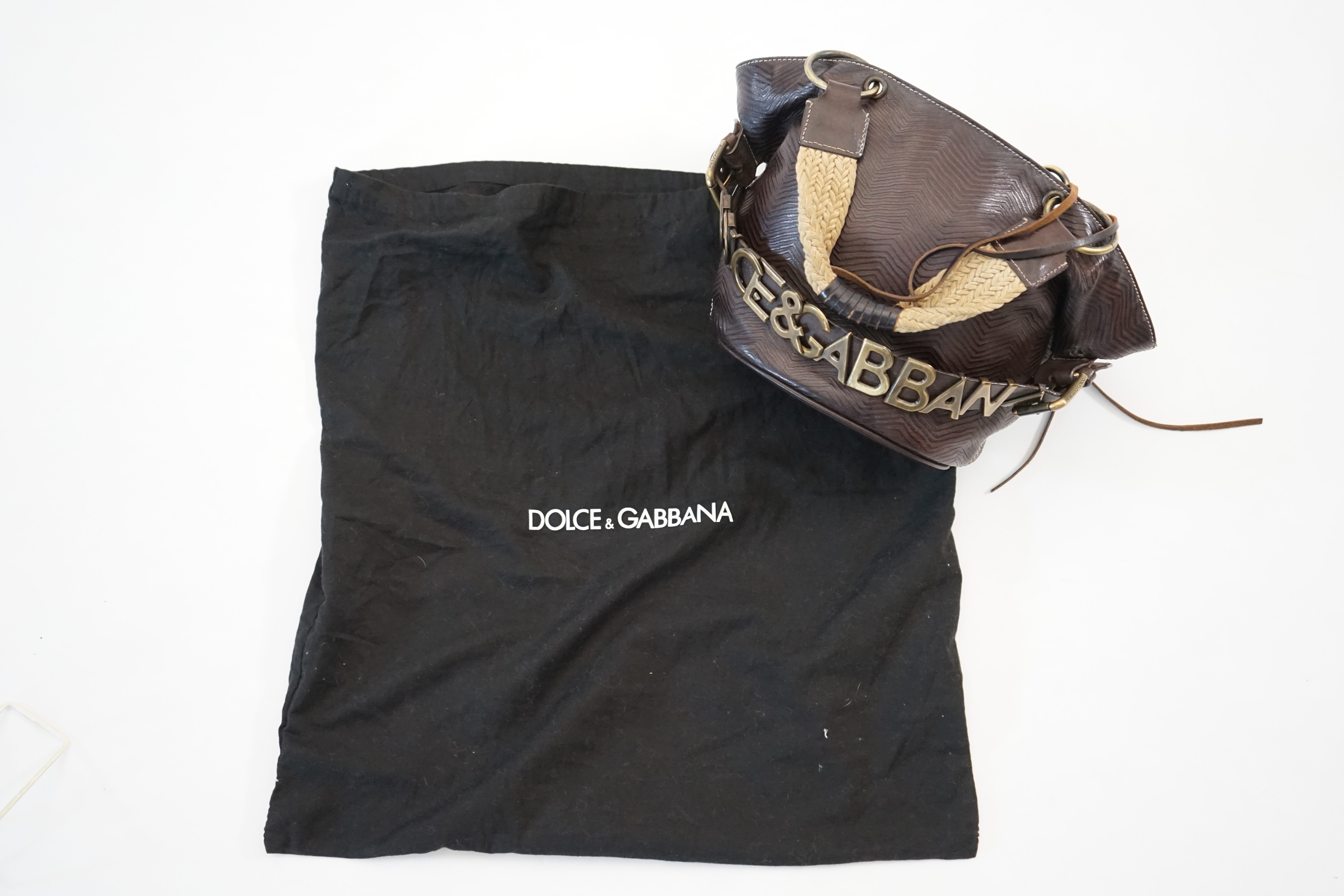 A Dolce & Gabbana brown and black leather bucket bag, width (max) 34cm, depth 14cm, height 20cm